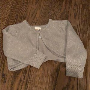 Baby Girls silver shimmer cardigan.